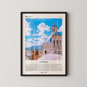 May include: Framed print featuring a vibrant image of Cuenca, Ecuador, under a bright blue sky with fluffy white clouds. The image showcases a church with a blue dome and intricate architecture, with the city in the background. Text at the bottom reads "CUENCA".