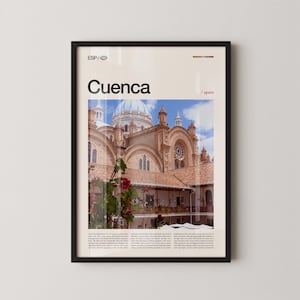May include: Framed art print featuring a photograph of the Cuenca Cathedral in Spain. The image shows the cathedral's dome and architectural details, with the word "Cuenca" and "Spain" printed on the top. The print is in a black frame.