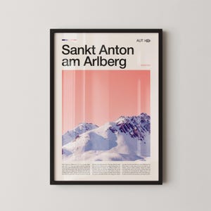 May include: A framed poster with the words "Sankt Anton am Arlberg" above a mountain scene. The poster has a pink and white colour scheme with the word "Austria" at the top. The mountains are covered in snow.