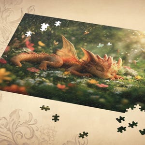 May include: A small, orange dragon with closed eyes sleeps peacefully in a field of flowers. The dragon has a light brown underbelly and a light brown wing. The background is a green field with a soft, blurry focus.