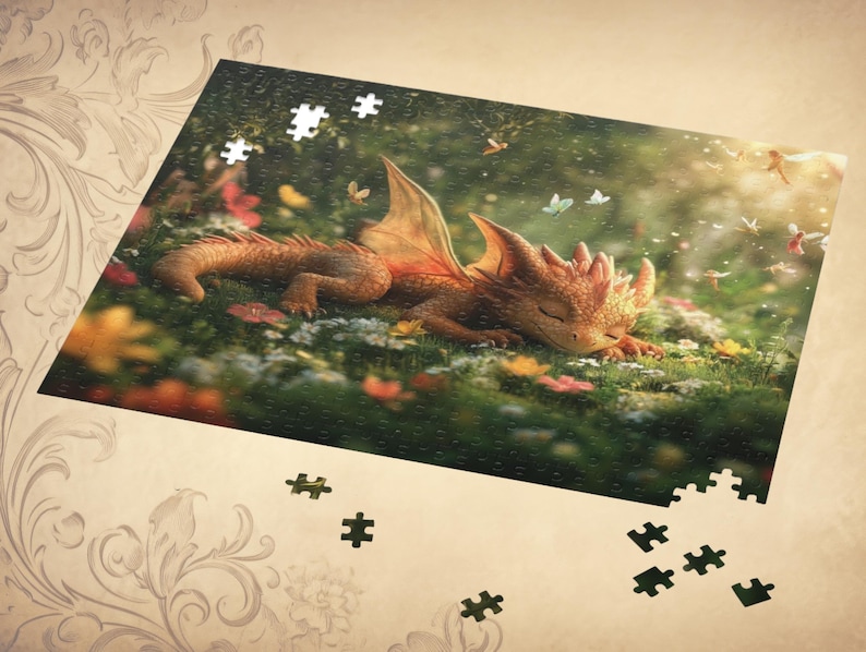 May include: A small, orange dragon with closed eyes sleeps peacefully in a field of flowers. The dragon has a light brown underbelly and a light brown wing. The background is a green field with a soft, blurry focus.