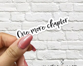 May include: White sticker with black cursive text that reads "One more chapter".