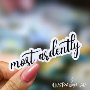 May include: White sticker with the text "most ardently" written in black cursive script.