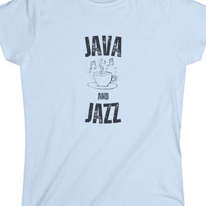 May include: Light blue t-shirt with black text that reads "JAVA" with musical notes and a steaming cup of coffee, "AND", and "JAZZ".