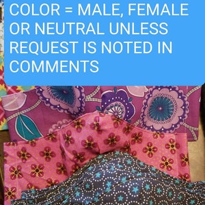 May include: A stack of colorful fabric face masks with floral and geometric patterns. The text on the blue background reads: "PLEASE READ THE DESCRIPTION TEXT - SIZE = ADULT OR CHILD COLOR = MALE, FEMALE OR NEUTRAL UNLESS REQUEST IS NOTED IN COMMENTS"