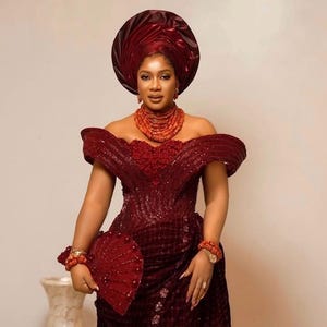 yoruba bridesmaid dresses Yoruba Nigerian Bride in Traditional Teal Dress, Gele Headwrap Doing Money Dance With Bridesmaids