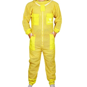 May include: A yellow beekeeping suit with a mesh design. The suit has a hood, a zipper down the front, and multiple pockets. The brand name "REVOKO" is visible on the chest. The suit is designed to protect the wearer from bee stings.