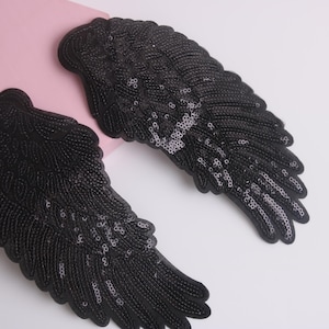a pair of black sequined angel wings patch, iron on patch, embroidered patch, funny patch, aesthetic patch, gorgeous patch, applique