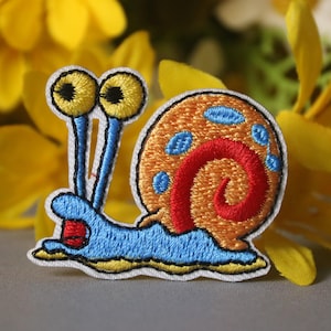 ful snigellapp, serielapp, självhäftande, stryklapp, broderad lapp, rolig lapp, estetisk lapp, vacker lapp, applikation