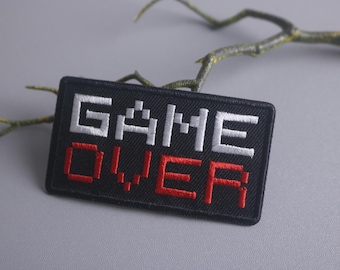 naszywka z napisem „koniec gry”, naszywka z gry, naszywka do prasowania, naszywka haftowana, naszywka zabawna, naszywka estetyczna, naszywka wspaniała, aplikacja