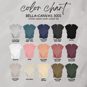 May include: Colour chart for Bella + Canvas 3001 unisex jersey short sleeve t-shirts. The chart shows 15 different colours, including athletic heather, heather deep teal, heather navy, dark grey heather, black, white, pink, heather peach, heather mauve, heather maroon, heather dust, natural, soft cream, heather olive, and heather forest.