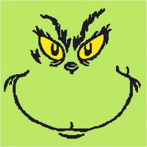 May include: A green cartoon face with black eyebrows, eyelashes, and a wide mouth. The face has two yellow eyes with black pupils.