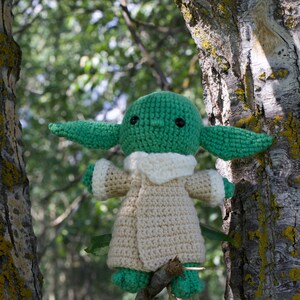 grogu baby yoda in tree