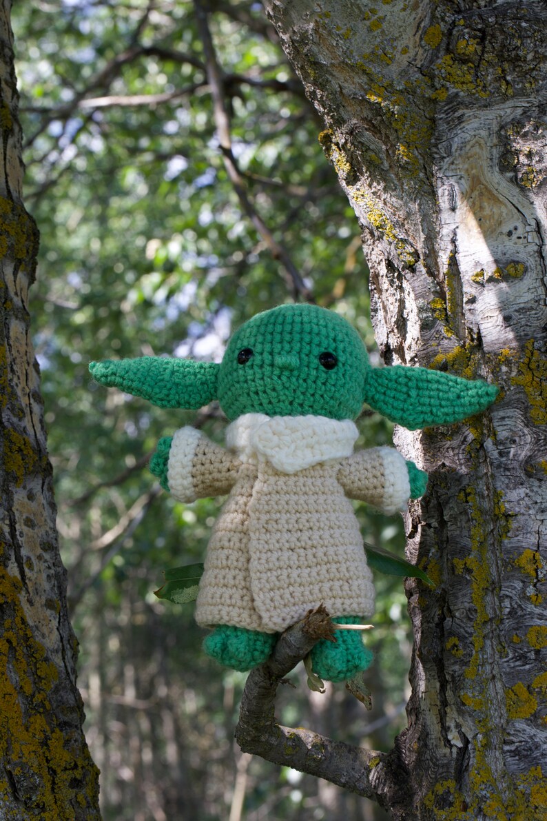 grogu baby yoda in tree