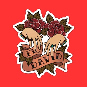 May include: A vintage-style tattoo design featuring two hands intertwined with roses and a banner reading "EW DAVID".