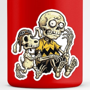 May include: A sticker featuring a cartoon illustration of a skeleton character wearing a yellow shirt with a black zig-zag design, and a skeleton dog wearing a pilot's cap. The sticker is on a red background.