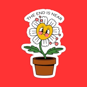 Puede incluir: Una margarita blanca con un centro amarillo y una cara sonriente está en una maceta marrón. La margarita está rodeada de pequeños corazones rosas y el texto "THE END IS NEAR" está por encima de la flor.