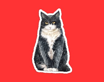 May include: A black and white cat with yellow eyes sits looking directly at the camera. The cat is painted in a watercolour style.