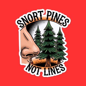May include: A sticker with a red background featuring a nose, three pine trees, and the words "SNORT PINES NOT LINES" in a vintage tattoo style. The nose is tan, the trees are green, and the text is in a bold, black font.