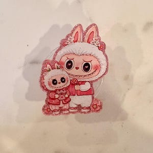 Pink monster phone grip