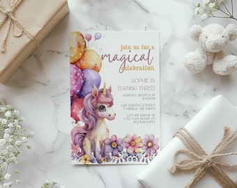 May include: A birthday invitation featuring a watercolor illustration of a unicorn with balloons and flowers. The invitation reads "Join us for a magical celebration" and includes event details. The invitation is surrounded by gifts and a stuffed animal.