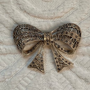 Sterling Silver Filigree Bow Brooch with Marcasites