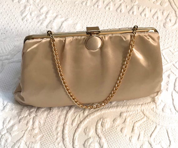 cream satin clutch bag