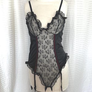 vintage sexy black lingerie with garters . sexy lingerie . nan flower