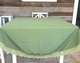 owalny obrus w kolorze awokado w stylu vintage z lat 70.