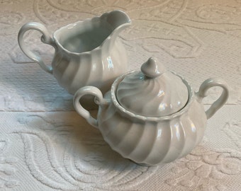 cream and sugar . ironstone  sugar bowl . ironstone creamer .made in England . Johnson Bros. Snowhite regency