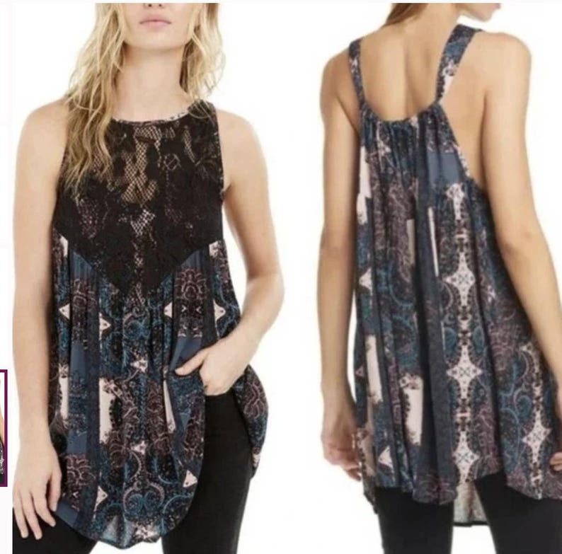 May include: A sleeveless, loose-fitting, black and blue patterned top with a black lace overlay. The top has a high neckline and a slightly longer back hem.