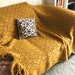 knitted blanket . knitted afghan . vintage knitted blanket . gold blanket . curry colored throw