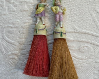 vintage half brushes with porcelain figurine . Hansel and Gretel brush set of 2