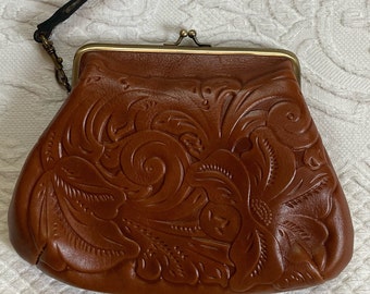 tooled leather wristlet . brown leather wristlet . Patricia Nash .