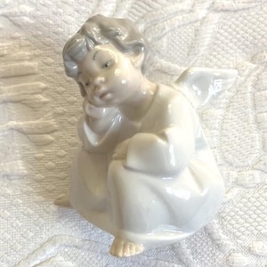 Lladro seated angel . angel boy figurine . vintage Lladro . hand made in spain
