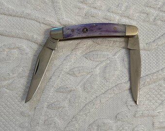 pocket knife. Whitetail cutlery . pocket knife .  purple bone knife  . collectors knife