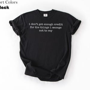 Puede incluir: Camiseta negra con el texto blanco: "i don't get enough credit for the things i manage not to say". Las palabras "Comfort Colors" y "Black" est&aacute;n arriba a la izquierda.