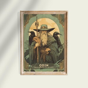 May include: A vintage-style poster featuring Odin, the Norse god of knowledge, war, and death. He is depicted with a long white beard, wearing a blue hat and a dark robe. He holds a spear in his right hand and is flanked by two black ravens.