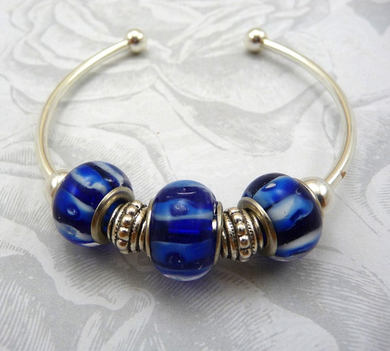 Items similar to Blue Glass Bangle Cuff Bracelet Silver on Etsy