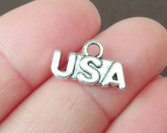 10 Charms, USA, Charm 15x9x1.5mm  SH141