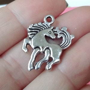 10 Charms, Horse Charms (double sided) 23x19x2mm ITEM:AF11