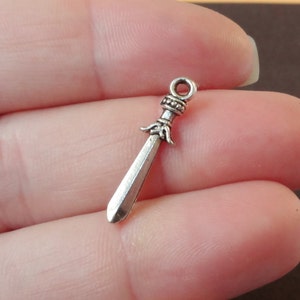 10 or 50 Charms, Sword Charm (double sided) 6x23x3mm Item:E13