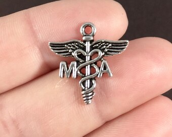 May include: Silver charm with a medical caduceus symbol and the letters "M.D.A."