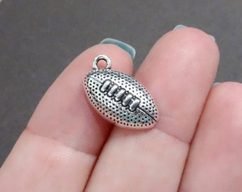 10 Football Charms 17x10x4.5mm ITEM:BU23