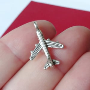 10 or 50 Charms, Airplane, Jet, Plane, Charms  22x15x3mm, Hole 2.5mm ITEM:W12