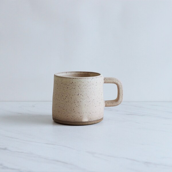 SALE : 10 oz mug with squared handle. Speckled clay, glazed in Peach Blush.