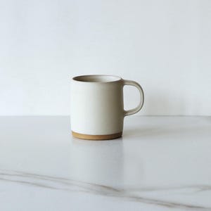 8 oz mug, glazed in Linen.