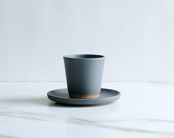 6 oz cup and saucer set. Speckled clay, glazed in Charcoal.