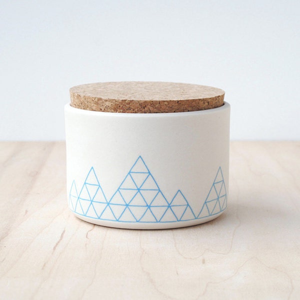 hand-etched porcelain cork jar.