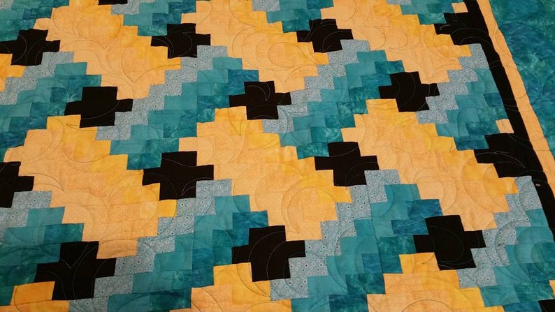 Tourquoise and Yellow Weaver Fever Twin Quilt